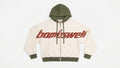 Sudadera con cremallera colorblock crema y oliva con wordmark bombswell grande en el pecho
