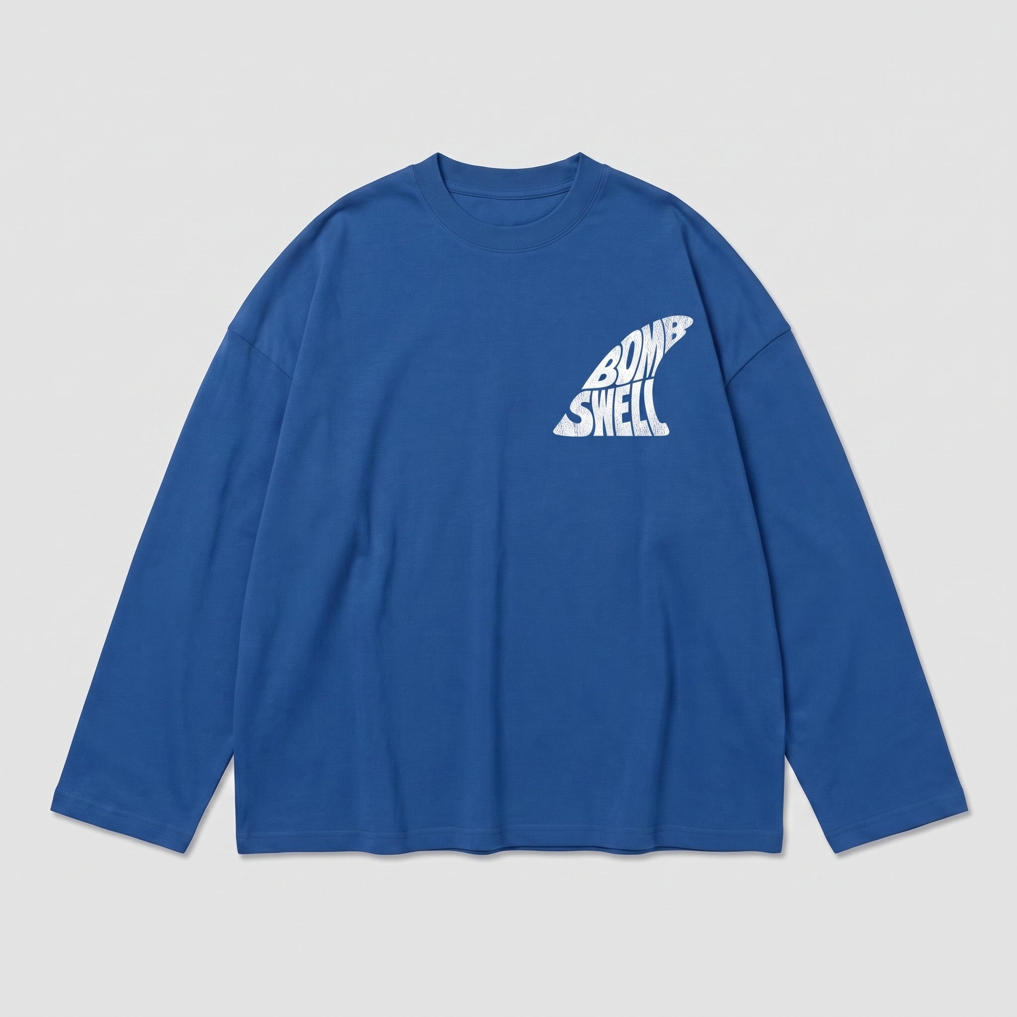 Camiseta manga larga oversize azul cobalto con logo fin Bomb Swell en el pecho