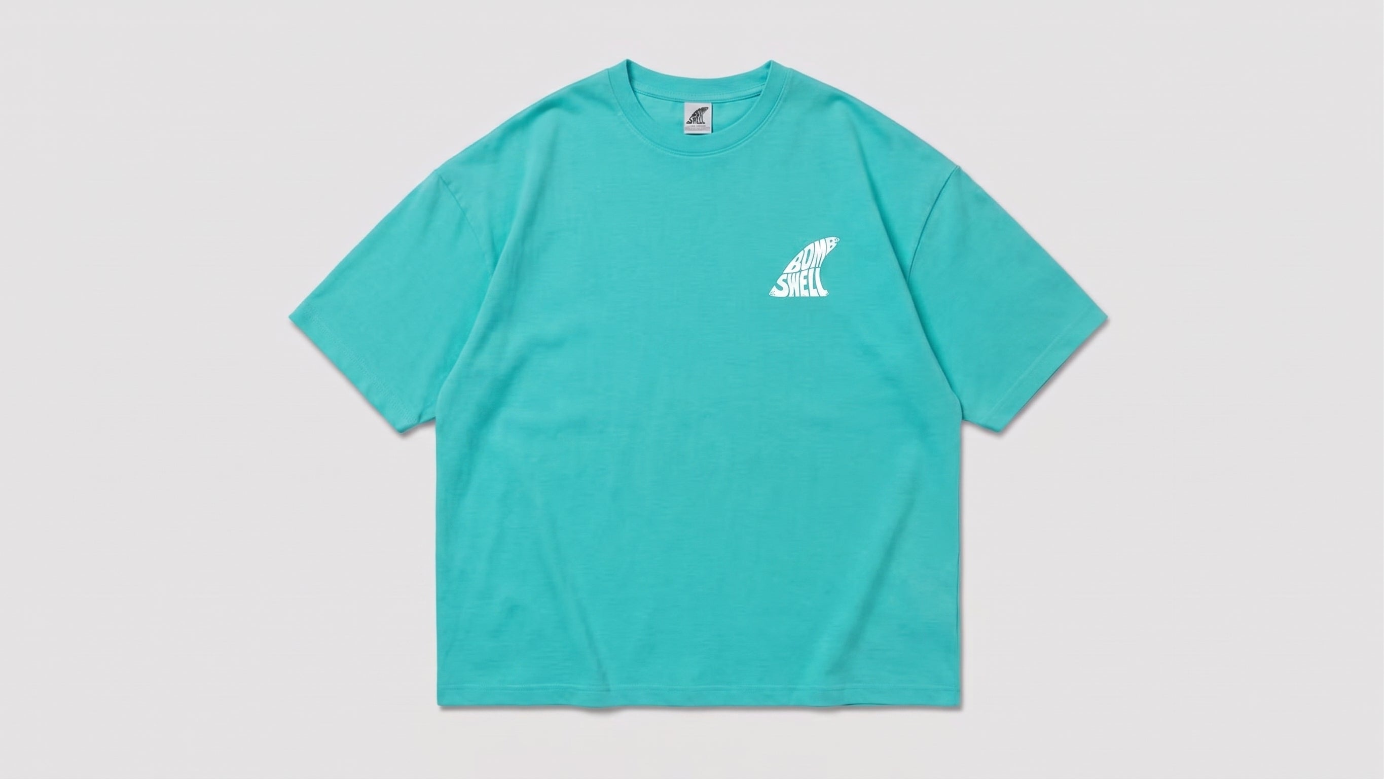 Camiseta oversize turquesa con logo fin Bomb Swell en el pecho