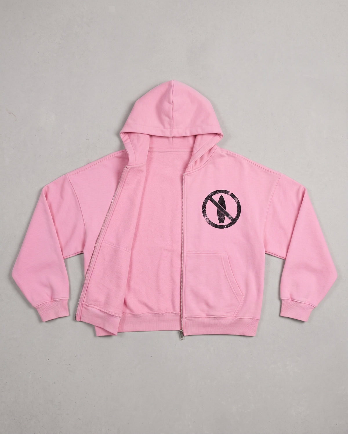 Sudadera con cremallera oversize rosa con icono de tabla de surf prohibida en el pecho